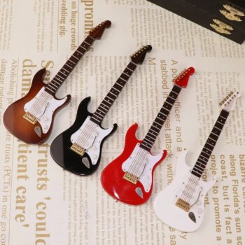מיני גיטרה מעץ לקישוט https://kolbomusic.com/mini-guitar-ornament/ 71939 d5iqmr