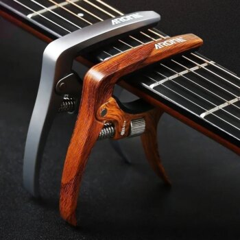 קאפו מתכוונן לגיטרה https://kolbomusic.com/capo-guitar-adjustable/ 72323 rkwi9p